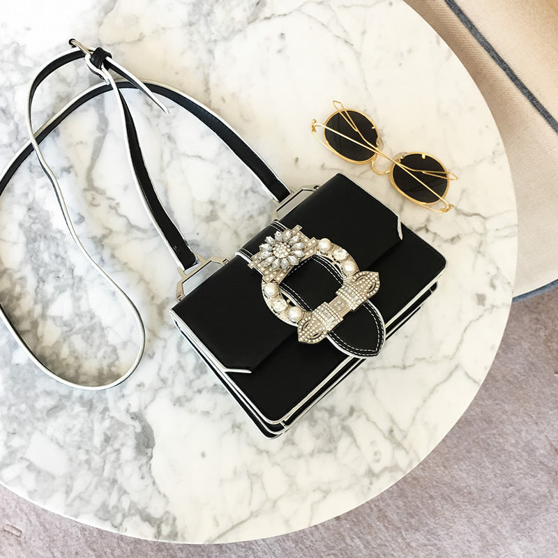 Elegant Designer Handbag with Diamond Lock